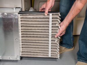 hands-changing-air-filter